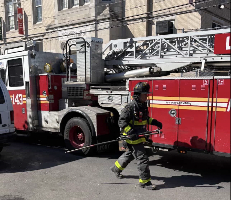 The firefighters arrive at the school to assess the situation in the cafeteria.