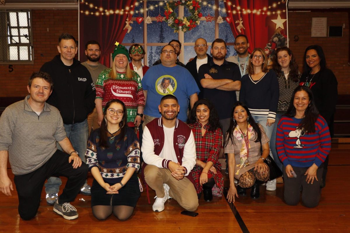 Richmond Hill High School faculty pose for a holiday picture.