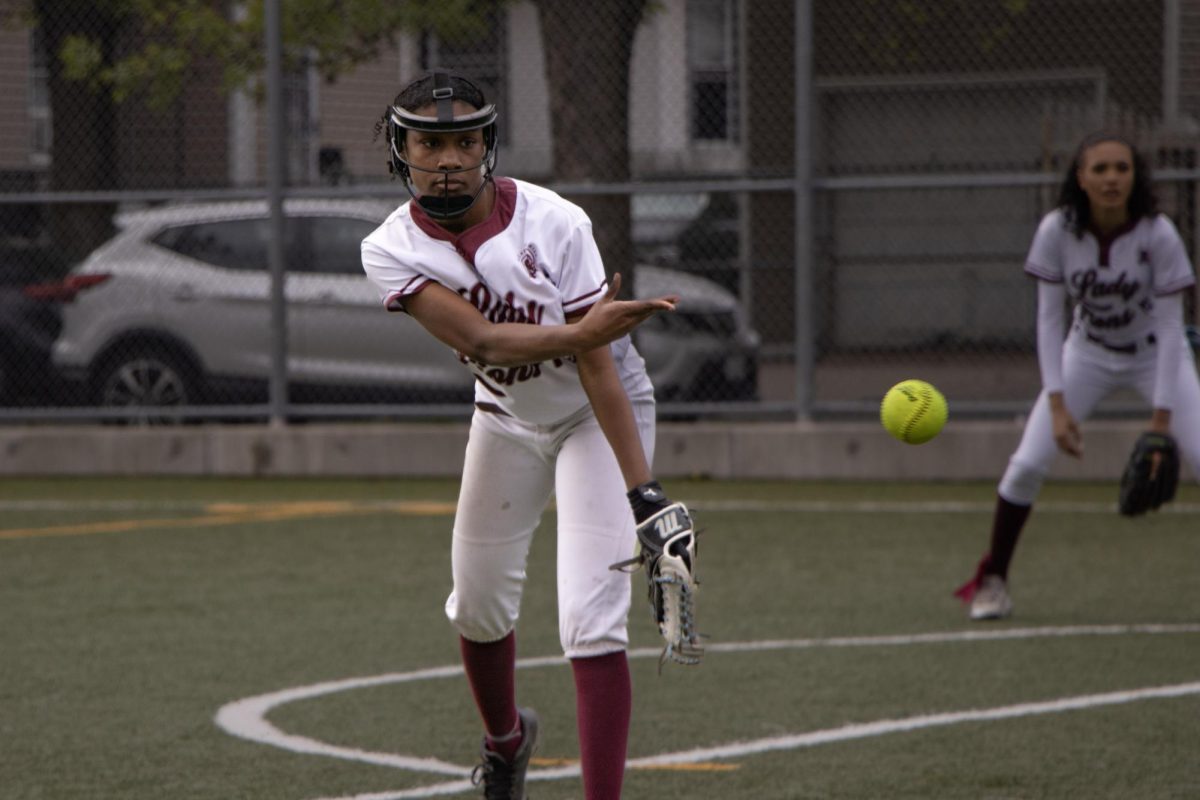 Renee Johnson locks in on the mound as she delivers a strike.
