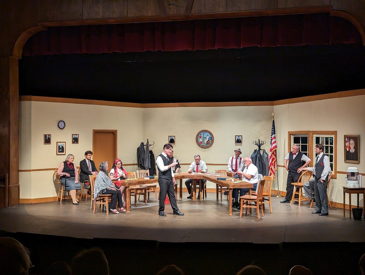 Actors perform "Twelve Angry Jurors," the mixed-gender version of "12 Angry Men," at a community theatre.